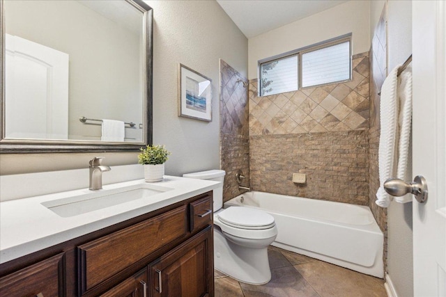 bathroom featuring washtub / shower combination, vanity, toilet, and tile patterned floors