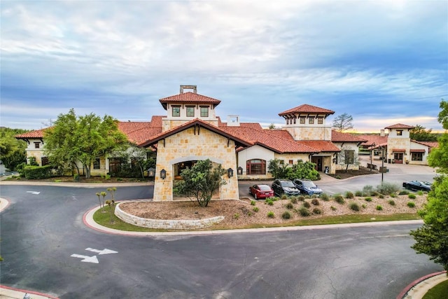 view of property featuring driveway