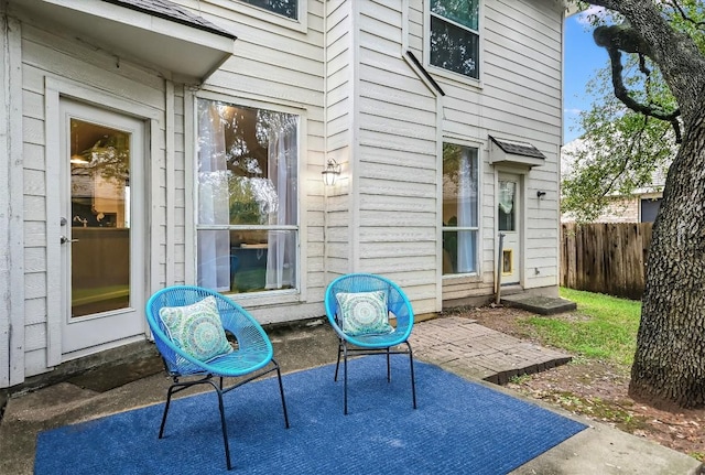 view of patio / terrace featuring fence