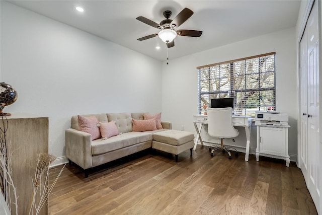 office featuring recessed lighting, ceiling fan, baseboards, and wood finished floors