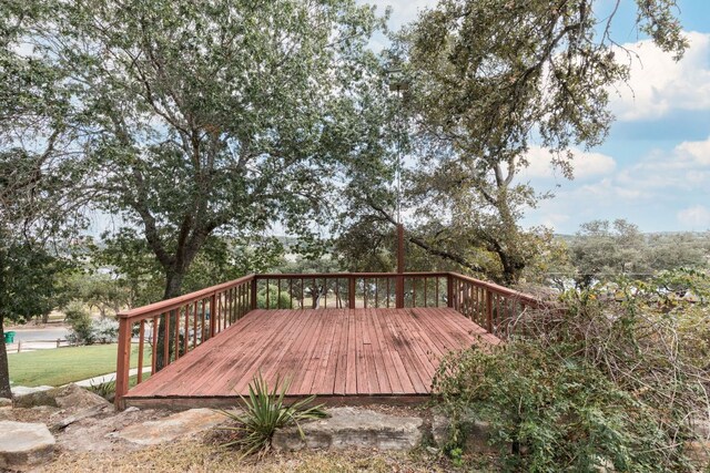 1105 Oak Hurst Rd, Austin, TX 78734 - wooden deck featuring a lawn