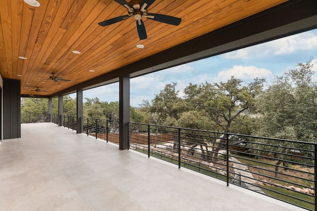 1105 Oak Hurst Rd, Austin, TX 78734 - patio / terrace with a ceiling fan and view of scattered trees