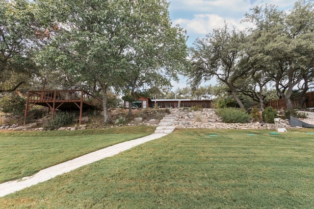 1105 Oak Hurst Rd, Austin, TX 78734 - view of green lawn featuring a wooden deck