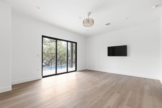 1105 Oak Hurst Rd, Austin, TX 78734 - spare room featuring light wood-type flooring and baseboards