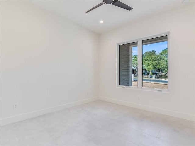 unfurnished room with recessed lighting, ceiling fan, and baseboards