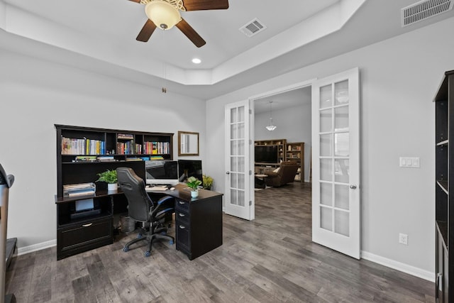 office featuring french doors, visible vents, baseboards, and wood finished floors