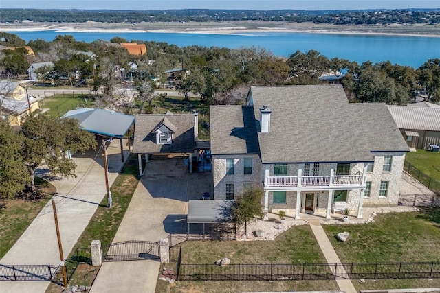 birds eye view of property featuring a water view