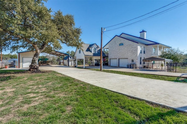exterior space featuring a garage and fence