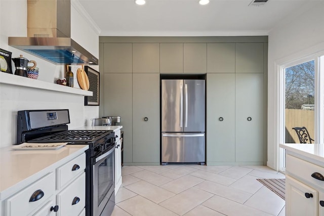 kitchen with wall chimney exhaust hood, light countertops, stainless steel appliances, and crown molding