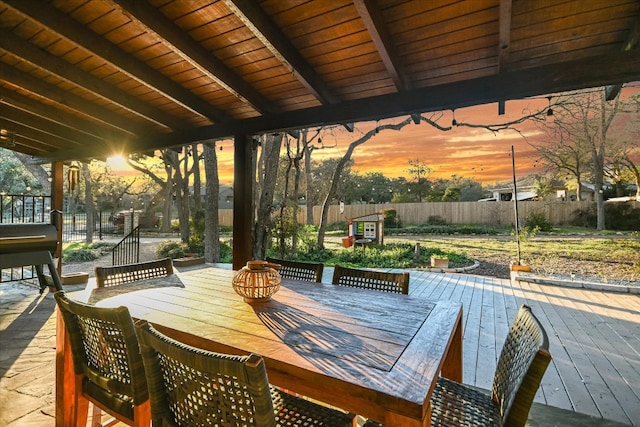 view of patio / terrace with fence, a deck, and outdoor dining space