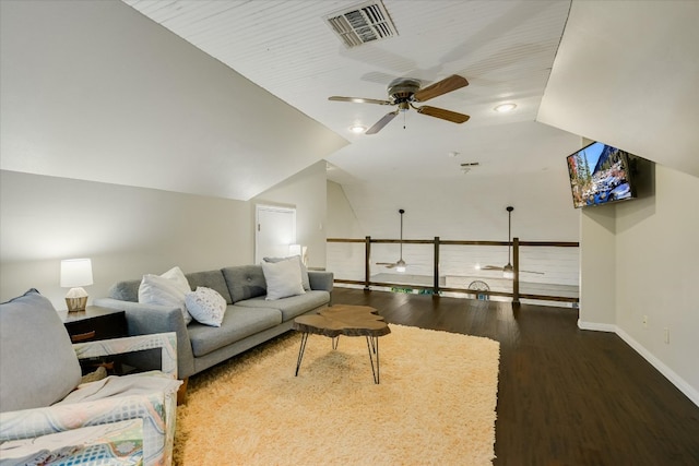 living area with lofted ceiling, ceiling fan, visible vents, and wood finished floors