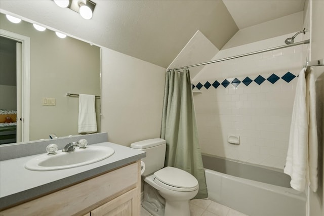 bathroom with toilet, tile patterned floors, vaulted ceiling, shower / bath combo with shower curtain, and vanity
