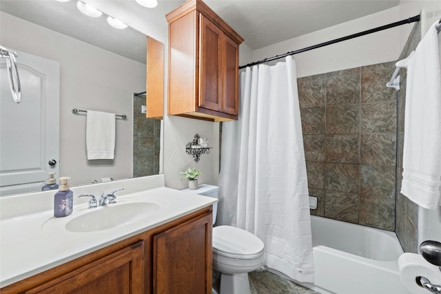 full bathroom with shower / tub combo, vanity, and toilet