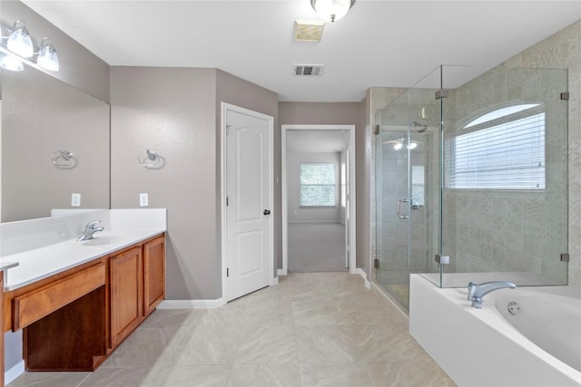 1532 Homewood Cir, Round Rock, TX 78665 - bathroom featuring vanity, a stall shower, a bath, and baseboards