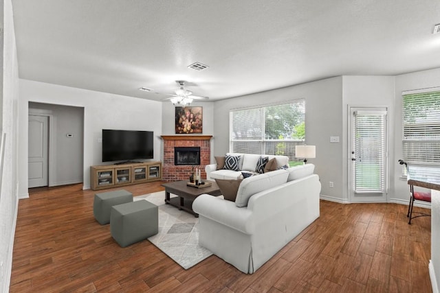 1532 Homewood Cir, Round Rock, TX 78665 - living area with a ceiling fan, healthy amount of natural light, and wood finished floors