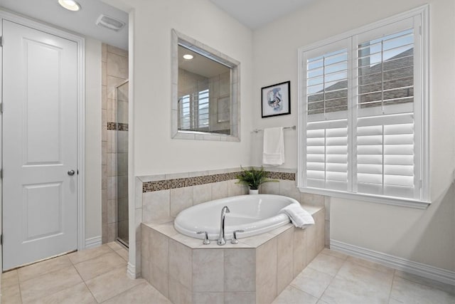 full bath with a stall shower, tile patterned flooring, visible vents, and a bath