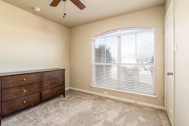 bedroom featuring carpet, baseboards, and ceiling fan