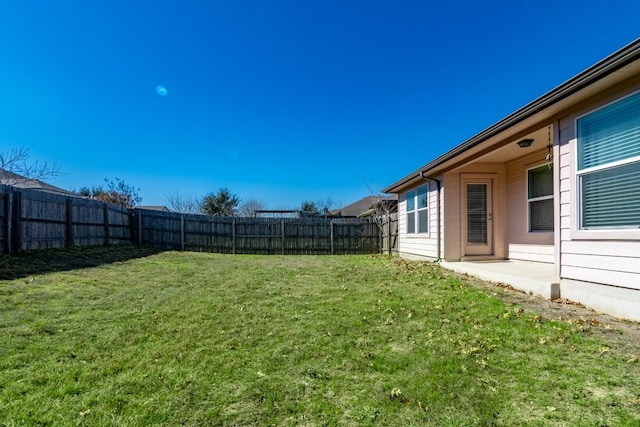 view of yard featuring a fenced backyard