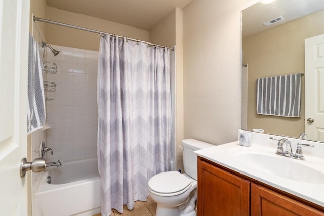 full bathroom with tile patterned flooring, toilet, visible vents, vanity, and shower / tub combo with curtain