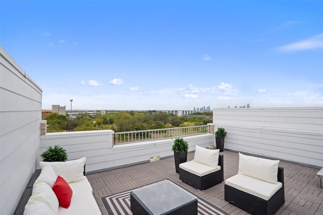 view of patio / terrace with outdoor lounge area and a city view