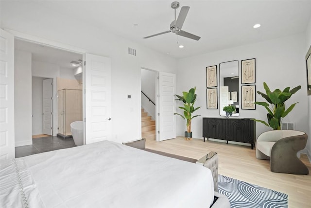 bedroom featuring ensuite bathroom, ceiling fan, recessed lighting, wood finished floors, and visible vents