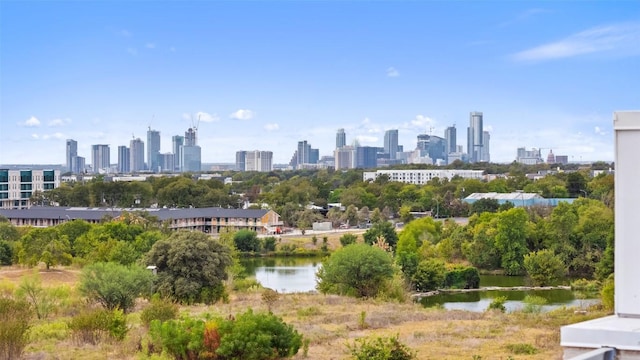 property's view of city featuring a water view