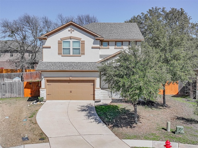 view of front of property featuring roof with shingles, stucco siding, an attached garage, fence, and driveway