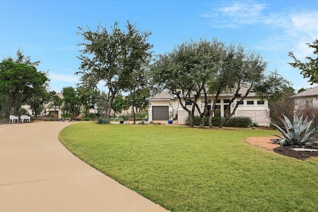 view of yard featuring an attached garage