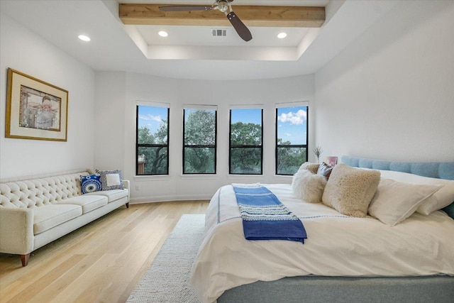 bedroom with beam ceiling, light wood finished floors, recessed lighting, visible vents, and a ceiling fan