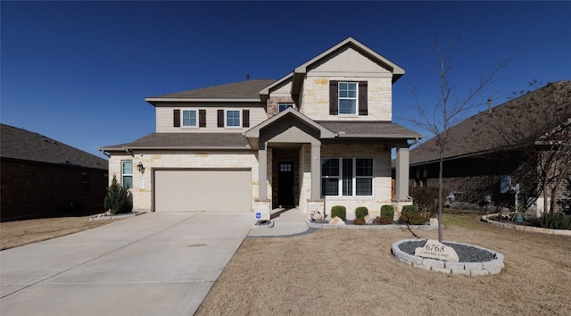 view of front facade with a garage, stone siding, roof with shingles, and concrete driveway