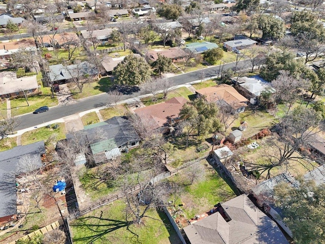 birds eye view of property with a residential view