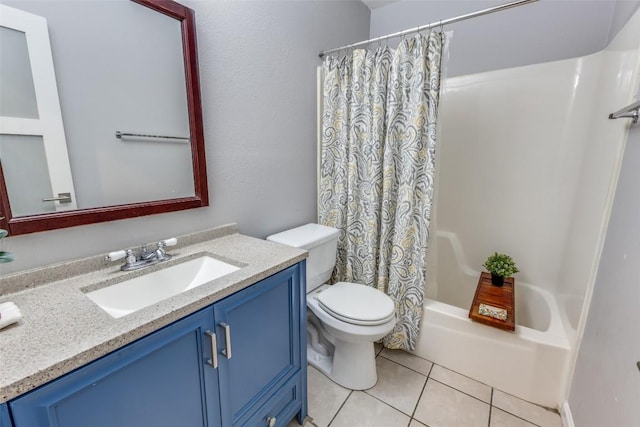 bathroom with toilet, shower / bath combo, vanity, and tile patterned floors