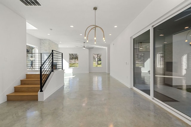 entrance foyer with ceiling fan, recessed lighting, visible vents, stairway, and finished concrete floors
