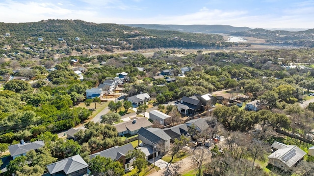 11009 Fourth St, Jonestown, TX 78645 - aerial view of property's location with a mountain backdrop and nearby suburban area