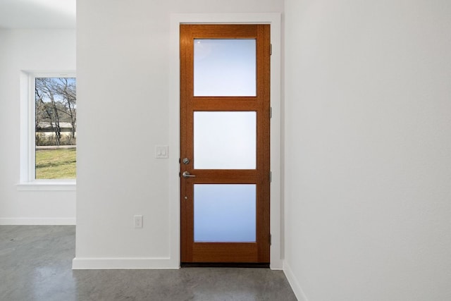 11009 Fourth St, Jonestown, TX 78645 - entrance foyer with concrete floors and baseboards