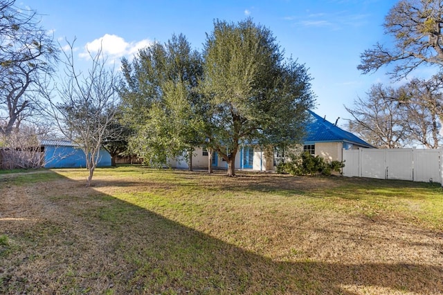 view of yard with fence