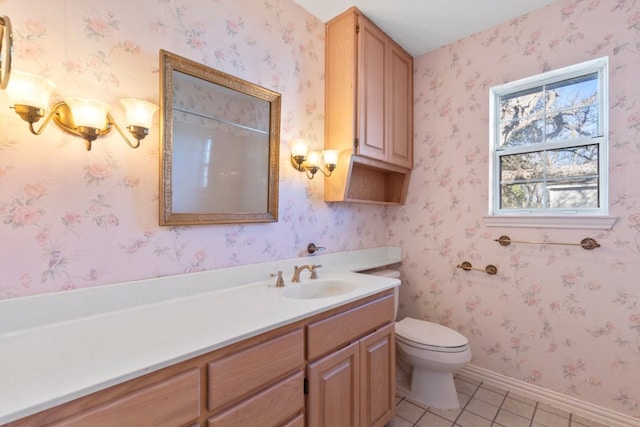 bathroom with wallpapered walls