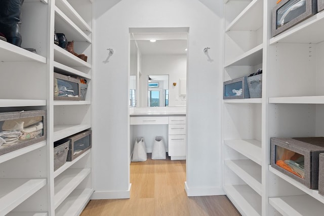 walk in closet featuring light wood-type flooring