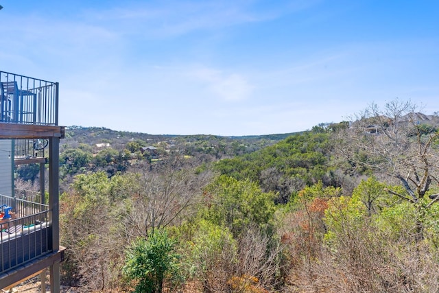 property view of mountains featuring a wooded view