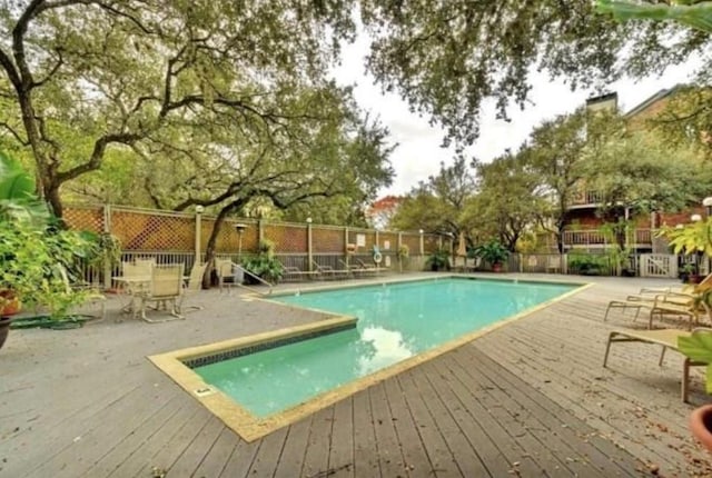 1741 Spyglass Dr Unit 1-232, Austin, TX 78746 - community pool with a wooden deck