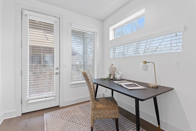 office space featuring wood finished floors and baseboards