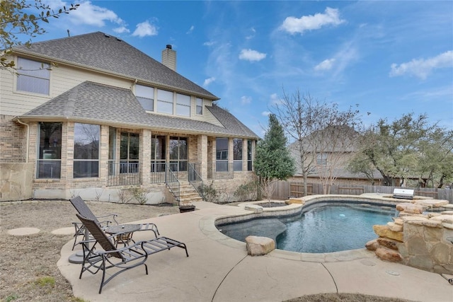 view of pool featuring a fenced in pool, a patio area, and a fenced backyard