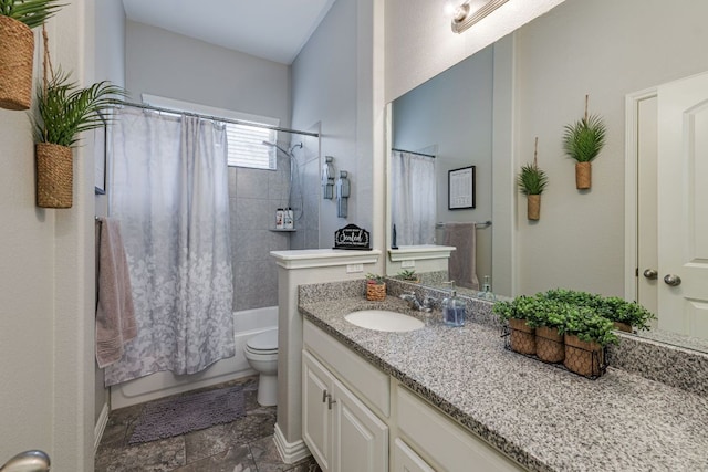 bathroom featuring toilet, shower / tub combo, and vanity