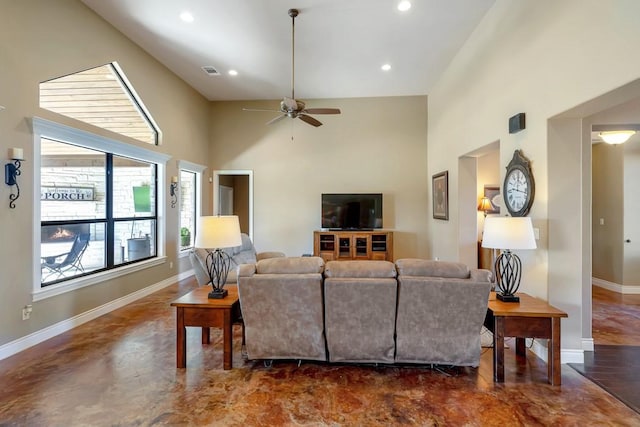 living room with recessed lighting, visible vents, a towering ceiling, and baseboards