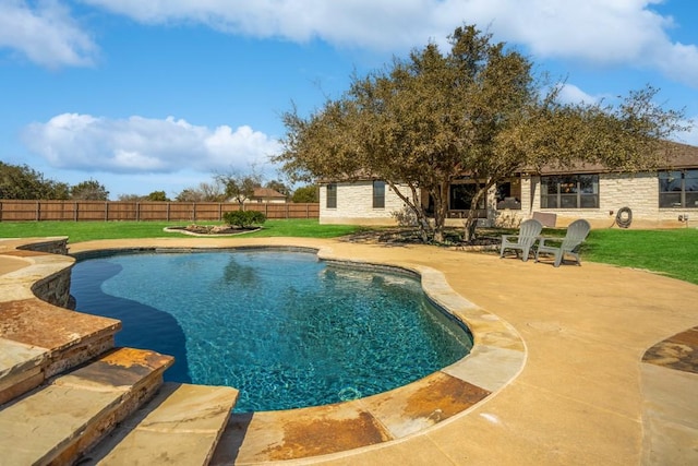 view of pool with a fenced in pool, a yard, a fenced backyard, and a patio