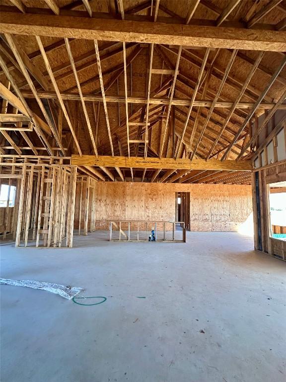 misc room featuring lofted ceiling