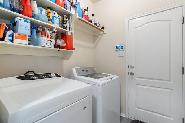 laundry room featuring laundry area and washer and clothes dryer