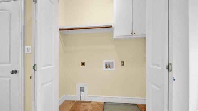 washroom featuring hookup for a washing machine, cabinet space, baseboards, and hookup for an electric dryer