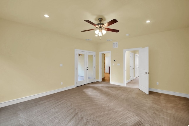 unfurnished bedroom with baseboards, visible vents, carpet flooring, french doors, and recessed lighting