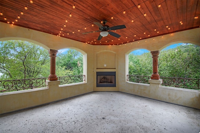 view of patio featuring ceiling fan